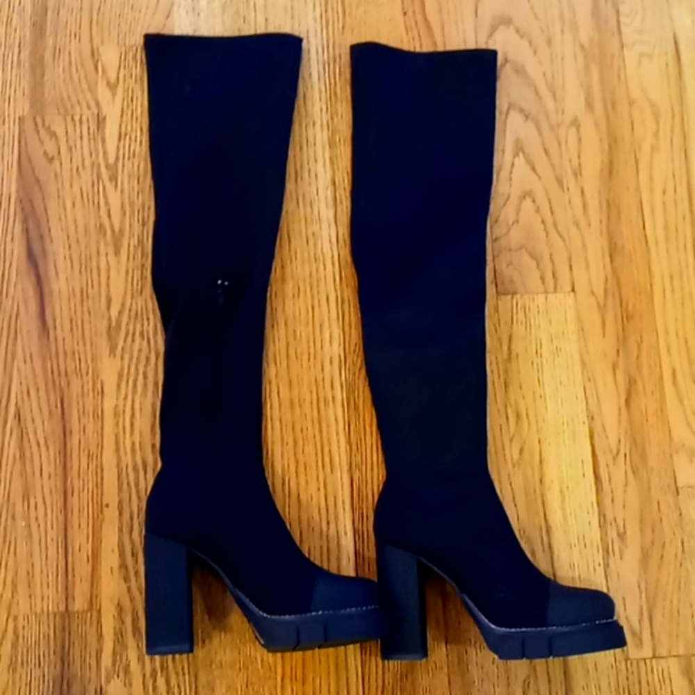 Black Strech, thigh high boot.